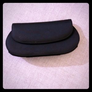 Mini Stuart Weitzman black satin clutch